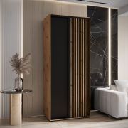 Kleiderschrank Tharo mit Schiebetüren in Eiche/Schwarz gehalten, viel Stauraum, auch für Wohnzimmer geeignet, Anti Staubbürsten, 235,2 x 120 x 45 cm