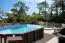 Holz-Pool Sunnydream 07, oval, 8,40 x 4,90 Meter, inklusive Premium Filteranlage, Filtermedium, Poolleiter, Poolfolie, Boden- und Wandvlies, Edelstahl-Eckverbindungen