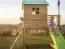 Spielturm S20B1, Dach: Grün, inkl. Wellenrutsche, Balkon, Sandkasten, Kletterwand und Holzleiter - Abmessungen: 330 x 331 cm (B x T)