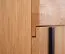 Kommode Slatina 11, Farbe: Eiche / Schwarz, teilmassiv - Abmessungen: 71 x 91 x 45 cm (H x B x T)