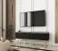 Moderner TV-Unterschrank mit geriffelter Front Horsham 37, Farbe: Schwarz, Push-to-open Funktion, Beine: Gold, hängend montierbar, ABS-Kantenschutz